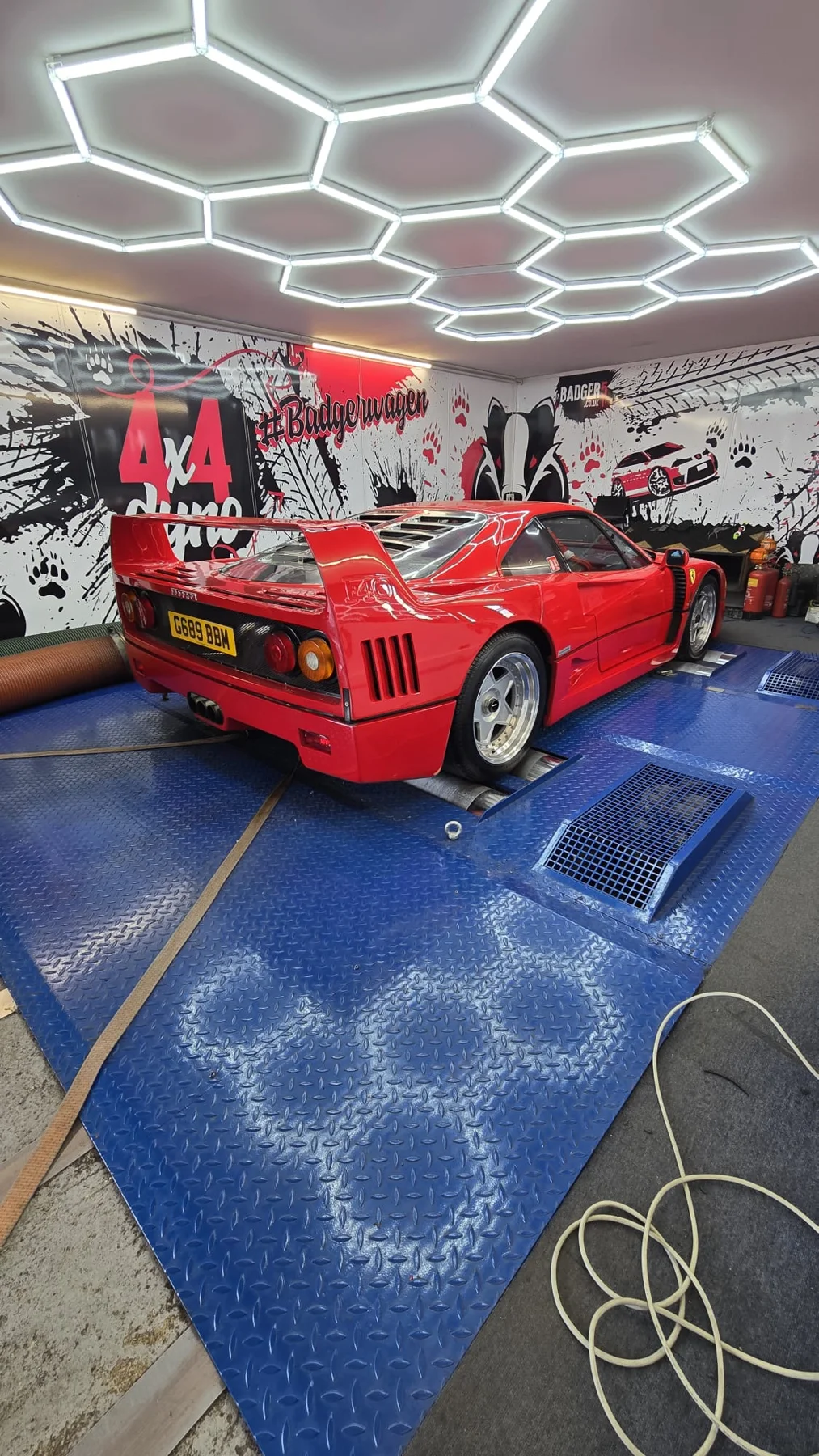 Red Ferrari on the rolling road in Badger5’s dedicated dyno cell